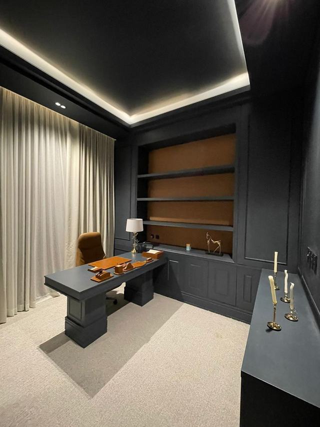 Executive office with built-in shelving